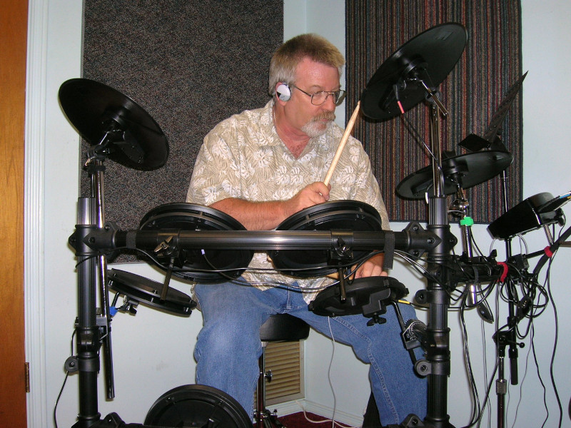 Chas on drums